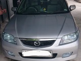 Mazda 323 2003 Car